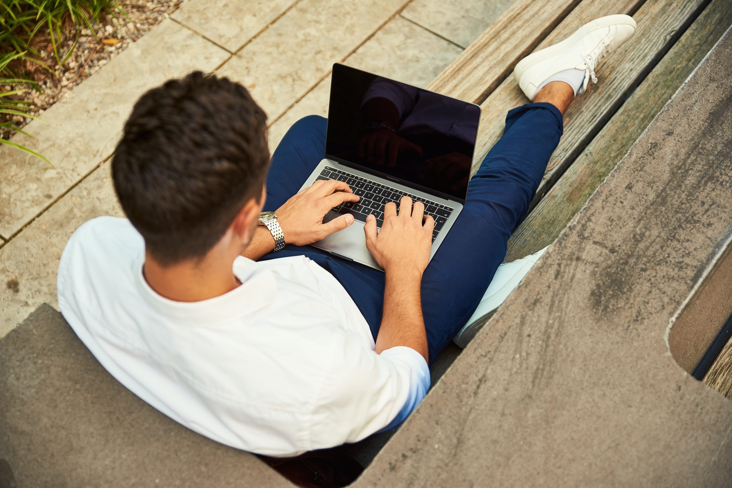 typing at laptop