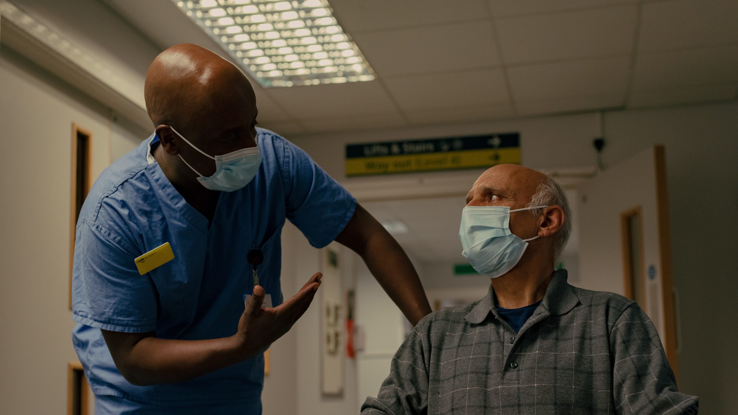 healthcare support worker helping a vulnerable man in the NHS